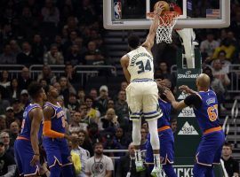 Giannis "Greek Freak" Antetokounmpo of the Milwaukee Bucks slam dunks against the NY Knicks at Fiserv Forum in Milwaukee, WI. (Image: Jeffrey Phelps/AP)