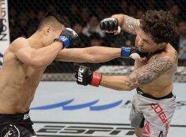 The Korean Zombie (left) scored a first-round TKO victory over Frankie Edgar (right) at UFC Fight Night 165 in South Korea. (Image: Jeff Bottari/Zuffa/Getty)