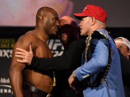 Kamaru Usman (left) takes on Colby Covington (right) in the main event of a stacked card for UFC 245 this Saturday. (Image: Josh Hedges/Getty)