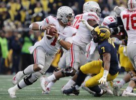 Ohio State quarterback Justin Fields has a knee injury that may limit his mobility in the Buckeyes-Tigers College Football Playoff Semifinal Fiesta Bowl game. (Image: USA Today Sports)