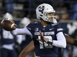 Despite being cited for marijuana possession last Saturday, Utah State quarterback Jordan Love will compete in the Frisco Bowl on Friday against Kent State. (Image: AP)