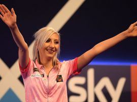 Fallon Sherrock became the first female darts player
To defeat a man at the Professional Dart Corporation (PDC) World Championship. (Image: Getty)