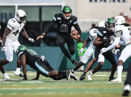 Quarterback Justin McMillan leads Tulane into the Armed Forces Bowl against traditional rival Southern Mississippi. (Image: Tulane Athletics)