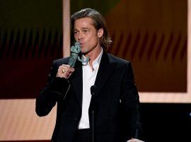 Brad Pitt kisses his SAG Award for winning Best Supporting Role for "Once Upon a Time in Hollywood." (Image: TNT)