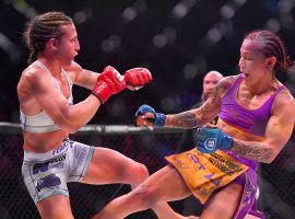 Cris Cyborg (right) defeated Julia Budd (left) on Saturday to win the Bellator women’s featherweight title. (Image: Jayne Kamin-Oncea/Getty)