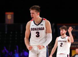 Gonzaga forward Filip Petrusev celebrates a victory against Oregon at the Battle 4 Atlantis in the Bahamas. (Image: Torrey Vail/Spokesman-Review)