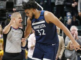 Minnesota Timberwolves center Karl-Anthony Towns chats with an official during a game against the Indiana Pacers. (Image: Getty)