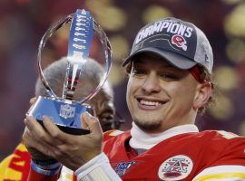 Kansas City Chiefs QB Patrick Mahomes holds the Lamar Hunt Trophy after winning the AFC Championship over the Tennessee Titans at Arrowhead Stadium. (Image: Charlie Neibergall/AP)