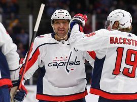 Washington Capitals teammates, Alexander Ovechkin and Nicklas Backstrom, celebrate a recent victory over the NY Islanders. (Image: Bruce Bennett/Getty)