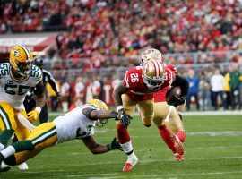 San Francisco 49ers RB Tevin Coleman evades the Green Bay Packers in the NFC Championship game at Levi Stadium in Santa Clara, CA. (Image: Michael Zagaris/Getty)