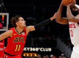 Atlanta Hawks guard Trae Young defends Houston Rockets star James Harden during a game at State Farm Arena in Atlanta, GA. (Image: Getty)