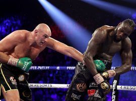 Tyson Fury (left) defeated Deontay Wilder (right) on Saturday to remain undefeated and claim the WBC heavyweight championship. (Image: Al Bello/Getty)