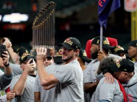 Major League Baseball officials are proposing an expansion to the playoffs that would see 14 teams reach the postseason each year. (Image: David J. Phillip/AP)