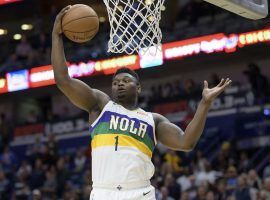 New Orleans Pelicans rookie Zion Williamson hauls down a rebound against Oklahoma City at the Smoothie King Center in New Orleans, LA. (Image: Matthew Hinton/AP)