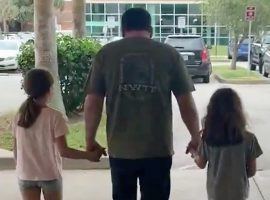 Ryan Newman walked out of Halifax Medical Center in Daytona Beach, FL holding his daughters hands on Wednesday, two days after his terrifying crash at the Daytona 500. (Image: Krissie Newman/Twitter)