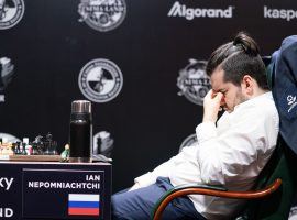 Ian Nepomniachtchi ponders a difficult position in Round 7 of the Candidates Tournament, which FIDE postponed on Thursday before Round 8. (Image: Maria Emelianova/FIDE)