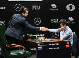 Ian Nepomniachtchi (left) scored his second straight win at the Candidates Tournament on Monday, beating Ding Liren (right) in Round 6. (Image: Maria Emelianova/FIDE)