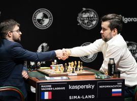 Maxime Vachier-Lagrave (left) grabbed a share of the Candidates Tournament lead by beating leader Ian Nepomniachtchi (right). (Image: Maria Emelianova/FIDE)