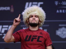Khabib Nurmagomedov is stuck in Russia due to international travel bans, meaning that he is unlikely to be able to fight Tony Ferguson at UFC 249. (Image: Getty/Stephen McCarthy)