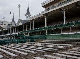 While racing will soon return to Churchill Downs, the surreal sight of empty stands will stick around for the foreseeable future. (Image: Pat McDonogh: Courier-Journal)