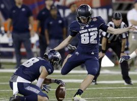 Utah State kicker Dominik Eberle connects on a field goal against New Mexico State in the Arizona Bowl. (Image: Rick Scuteri/AP)