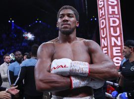 Anthony Joshua (pictured) could fight Tyson Fury in a unification bout, but contractual issues might stand in the way. (Image: Getty)