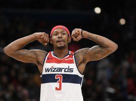 Bradley Beal flexes after he knocks down a 3-pointer at the Capital One Arena in Washington, DC. (Image: Nick Wass/AP)
