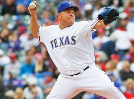 Bartolo Colon, pitching for the Texas Rangers in 2018 at age 45. (Image: Porter Lambert/Getty)