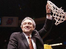 Eddie Sutton, then coach of the Oklahoma State Cowboys, cuts down the net after advancing to the Final Four in 2004. (Image: Oklahoma State Athletics)