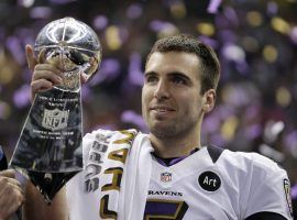 Joey Flacco, QB for the Baltimore Ravens, holds up the Lombardi Trophy after winning Super Bowl XLVII in 2013. (Image: Matt Slocum/AP)