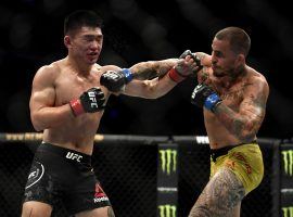 UFC on ESPN 8 – which included this fight between Song Yadong (left) and Marlon Vera (right) was part of the first big weekend for sportsbooks during the COVID-19 pandemic. (Image: Douglas P. DeFelice/Getty)