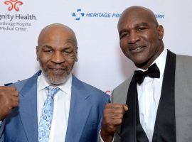 Evander Holyfield, right, has been training for a comeback fight, and said it might occur with former nemesis Mike Tyson. (Image: Getty)