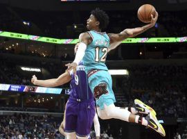 Memphis Grizzlies rookie point guard, Ja Morant, throwing down a dunk against the Charlotte Hornets. (Image: Karen Focht/AP)