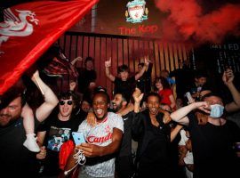 Liverpool supporters celebrated Thursday night after the club clinched its first Premier League ever and its first English league crown in 30 years. (Image: Phil Noble/Reuters)