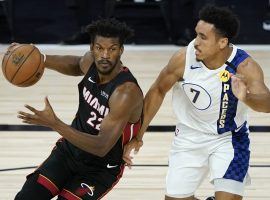 Miami Heat point guard Jimmy Butler drives by Indiana Pacers guard Malcolm Brogdon in Game 3 of the NBA Playoffs. (Image: USA Today Sports)