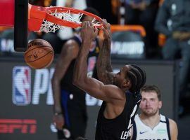 LA Clippers forward Kawhi Leonard dunks against the Dallas Mavericks in the first round of the 2020 NBA Playoffs. (Image: Ashley Landis/AP)