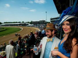 This scene of well-dressed fans soaking up the Kentucky Derby atmosphere will not happen this year. Churchill Downs officials announced the 146th Kentucky Derby will run without fans due to a coronavirus spike. (Image: Eclipse Sportswire)