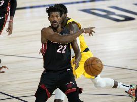 Miami Heat guard Jimmy Butler with a sleight of hand pass against the Indiana Pacers. (Image: Getty)