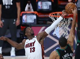 Miami Heat forward Bam Adebayo blocks Boston Celtics forward Jayson Tatum in Game 1. (Image: AP)