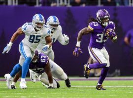 Dalvin Cook of the Minnesota Vikings scampers for a first down against the Detroit Lions in 2019. (Image: Dustin Dakota/Getty)