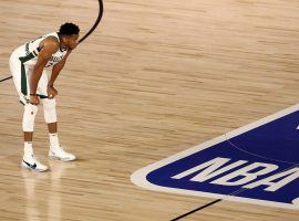 Giannis 'Greek Freak' Antetokounmpo catches a breath during Game 3 of the Eastern Conference Semifinals against the Miami Heat. (Image: Mike Ehrmann/Getty)