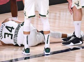 Milwaukee Bucks All-Star Giannis 'Greek Freak' Antetokounmpo on the floor after an ankle injury in Game 4 against the Miami Heat. (Image: Getty)