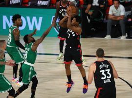 Toronto Raptors guard Kyle Lowry surrounded by the Boston Celtics in Game 6. (Image: Kim Klement/Getty)