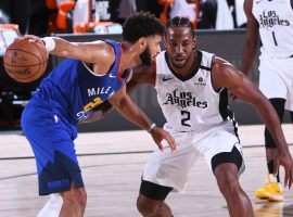 Jamal Murray of the Denver Nuggets defended by LA Clippers All-Star Kawhi Leonard. (Image: Garrett Ellwood/Getty)