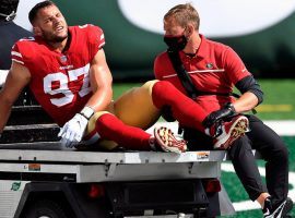 San Francisco 49ers end Nick Bosa carted off turf at MetLife Stadium after an ACL injury against the NY Jets. (Image: Sarah Stier/Getty)