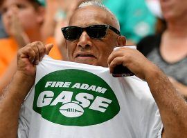 One disgruntled New York Jets fans displays his "Fire Adam Gase" t-shirt at a game in 2019. (Image: Getty)