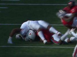 Texas running back Bijan Robinson lands in an unnatural position after trying to hurdle a Texas Tech defender. (Image: Fox Sports)