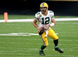 Aaron Rodgers of the Green Bay Packers takes in Tom Brady and the Tampa Bay Bucs in NFL Week 6. (Image: Sean Gardner/Getty)