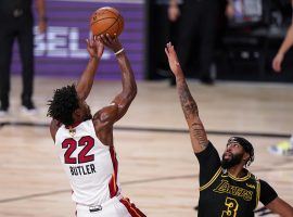 Anthony Davis of the LA Lakers guards Jimmy Butler from the Miami Heat in Game 4. (Image: Mark J. Terrill/AP)