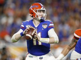MIAMI, FLORIDA - DECEMBER 30:  Kyle Trask #11 of the Florida Gators looks to pass against the Virginia Cavaliers during the first half of the Capital One Orange Bowl at Hard Rock Stadium on December 30, 2019 in Miami, Florida. (Photo by Michael Reaves/Getty Images)